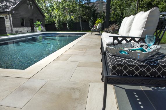 Custom Stone Pool Decks Can Accentuate a Yard
