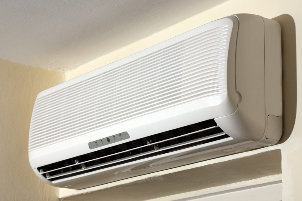 Homeowners Prepare Their AC Units For Summer