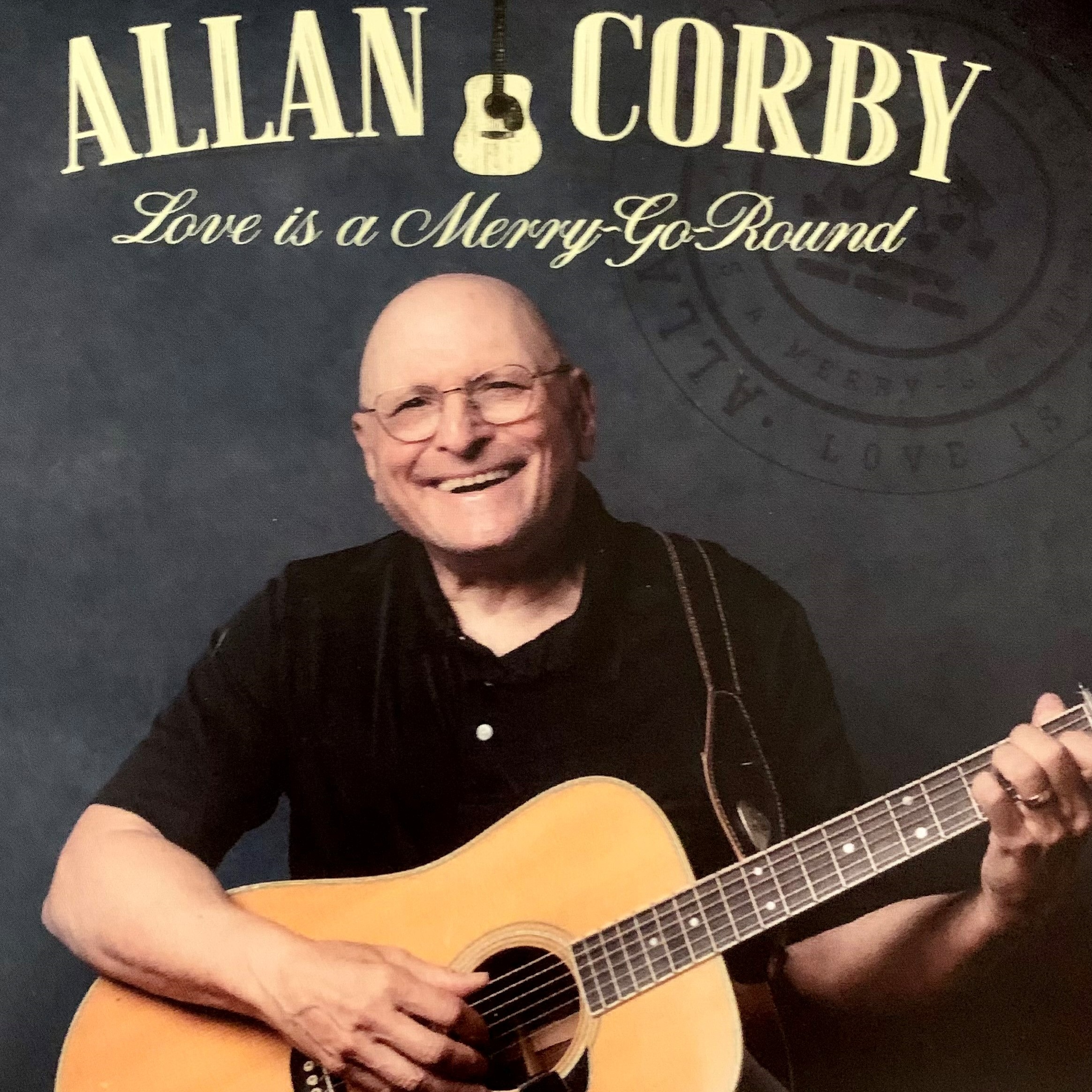 Allan Corby Inspires with the Guitar in Latest Album, "Love is A Merry-Go-Round"